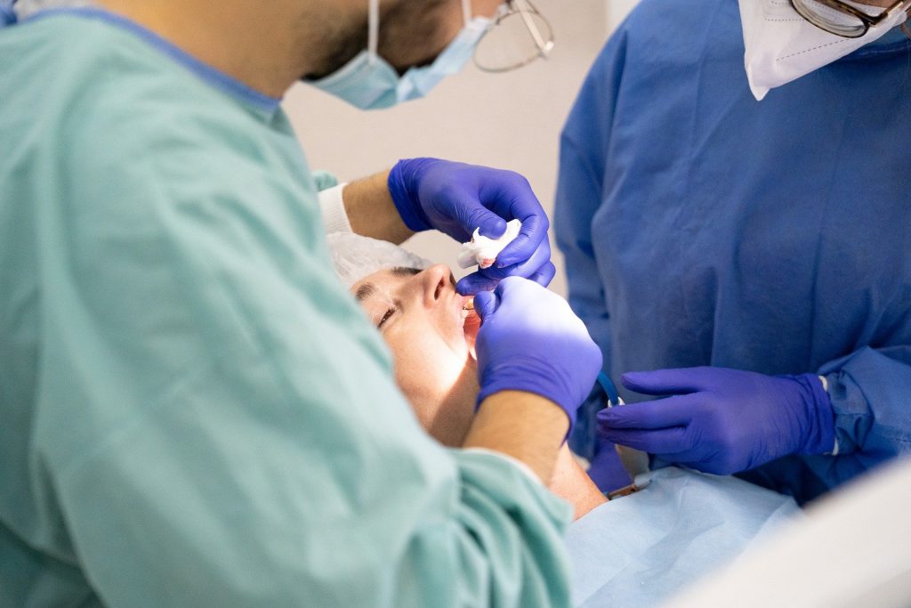 patient receiving dental implants